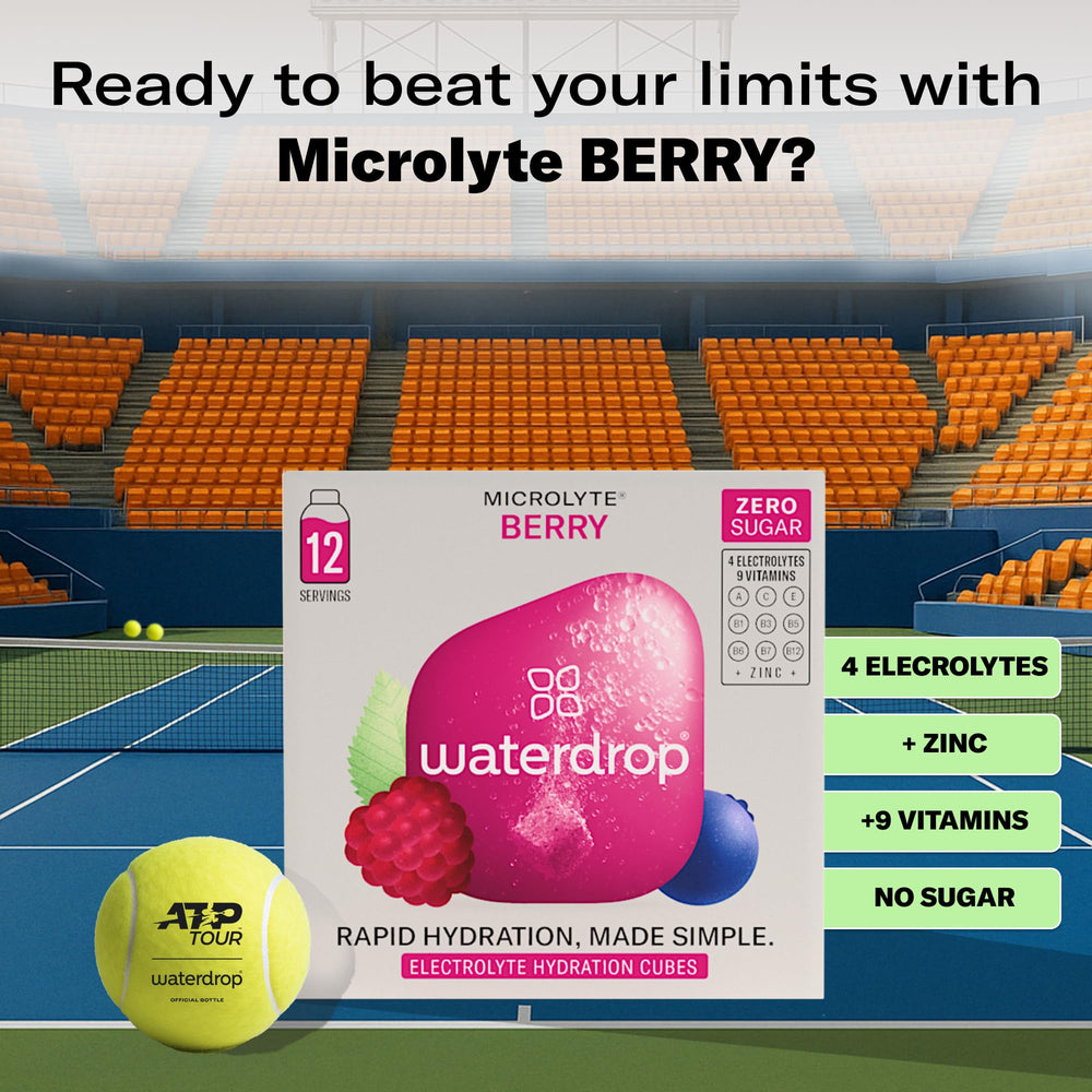 Waterdrop Microlyte Berry cubes poured into a glass for on-the-go hydration.