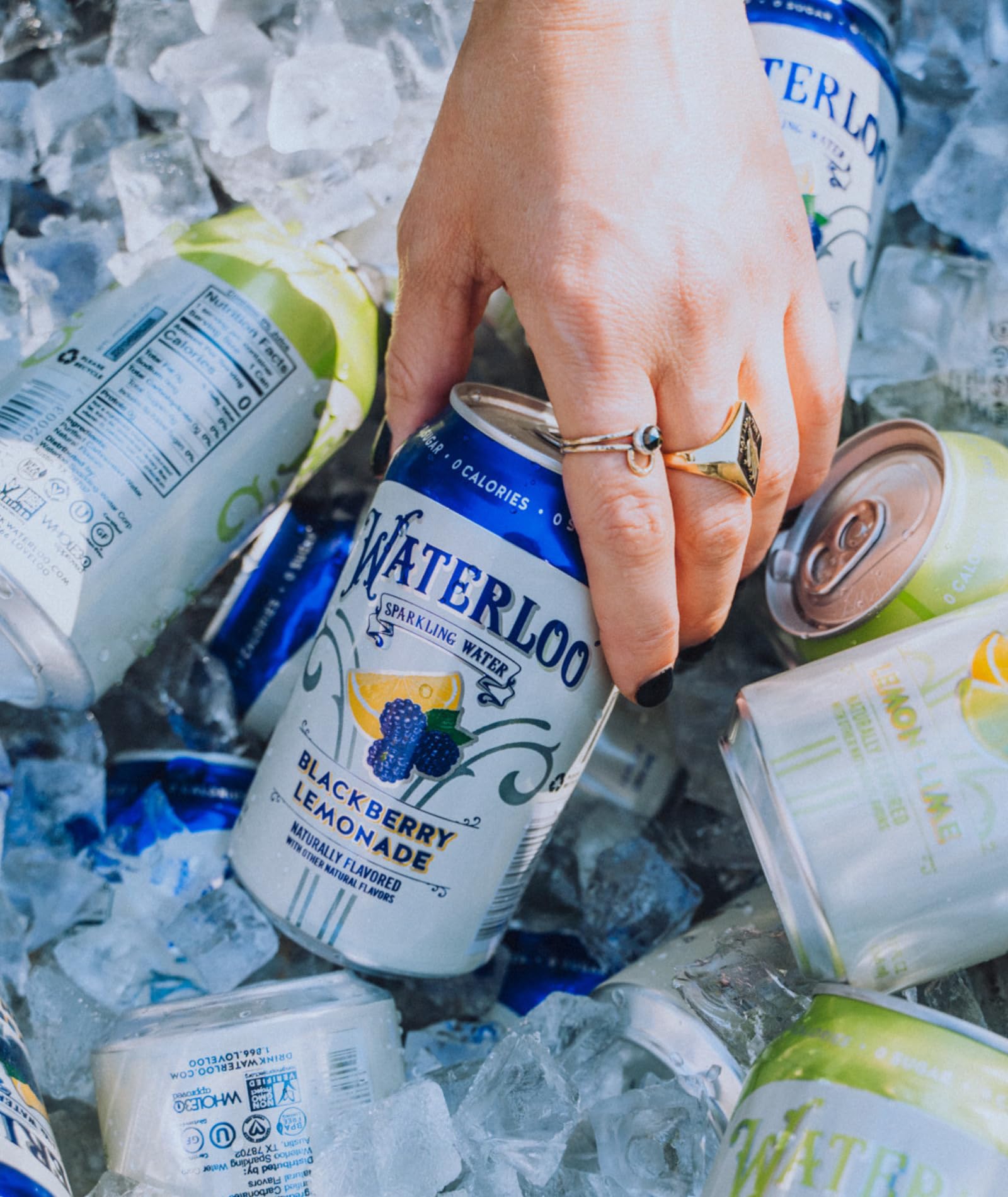 Waterloo Sparkling Water Blackberry Lemonade label highlights zero calories and authentic taste.