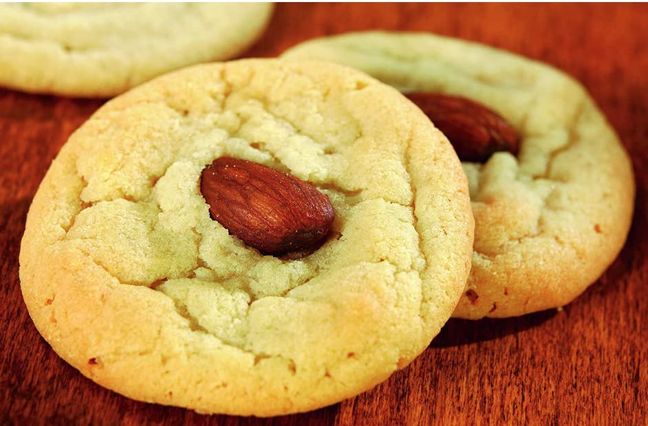 Watkins Pure Almond Extract USA-made quality for home bakers.