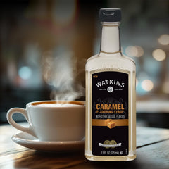 Close-up of Watkins caramel syrup bottle highlighting gluten-free and kosher status.