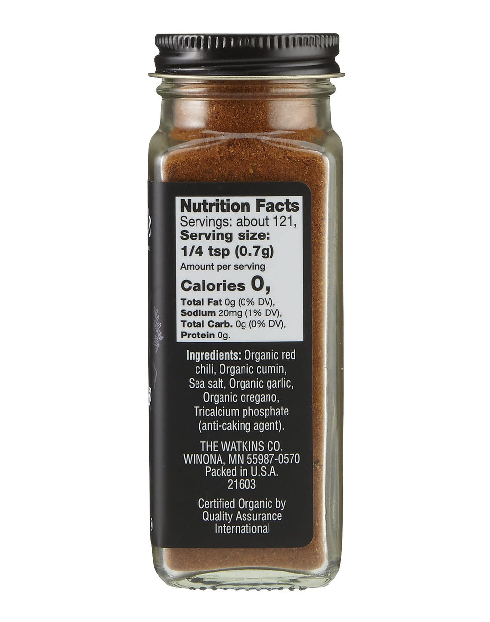 Close-up of the grinder pour on Watkins chili powder.