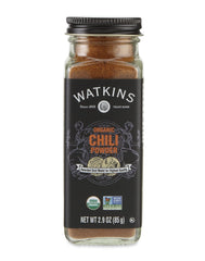 Watkins chili powder in a square glass bottle for organized pantry storage.