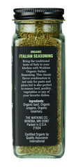 Close-up of Watkins square glass grinder with Italian herbs ready to grind.