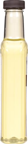 Watkins lemon extract amber liquid closeup reveals vibrant citrus essence