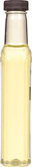 Watkins lemon extract amber liquid closeup reveals vibrant citrus essence