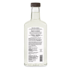 Watkins lemon extract bottle pour shows easy flavoring for drinks and desserts