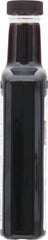Watkins non-GMO Kosher label on bottle signaling clean, versatile vanilla use