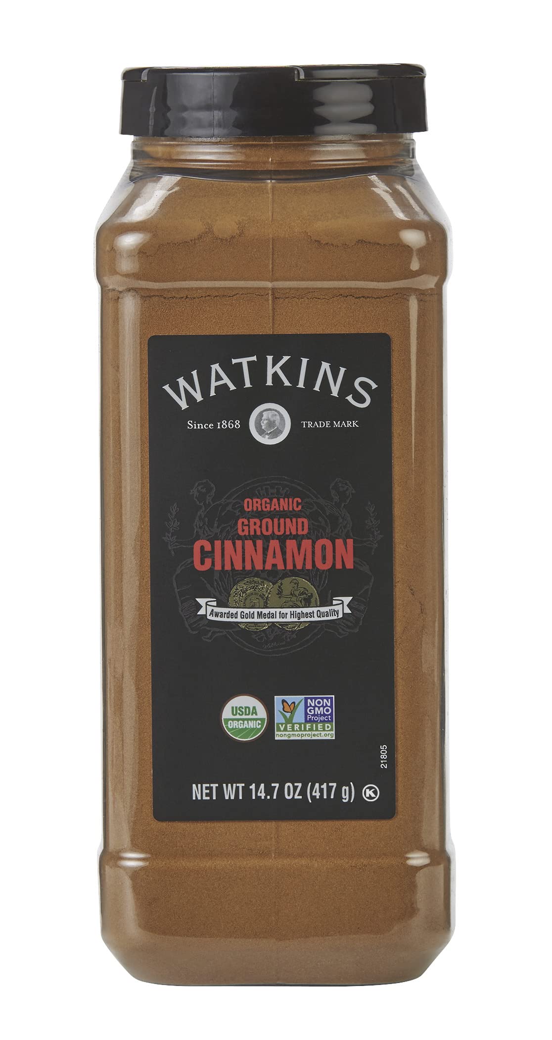 Watkins Organic Ground Cinnamon on spoon, warm aroma for baking