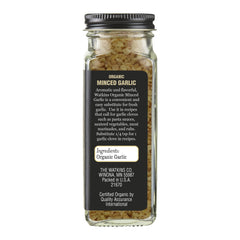 Watkins Organic Minced Garlic jar closeup highlights texture for flavor boost.