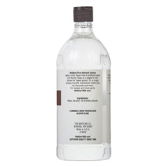 Watkins Pure Almond Extract bottle cap showing controlled pour.