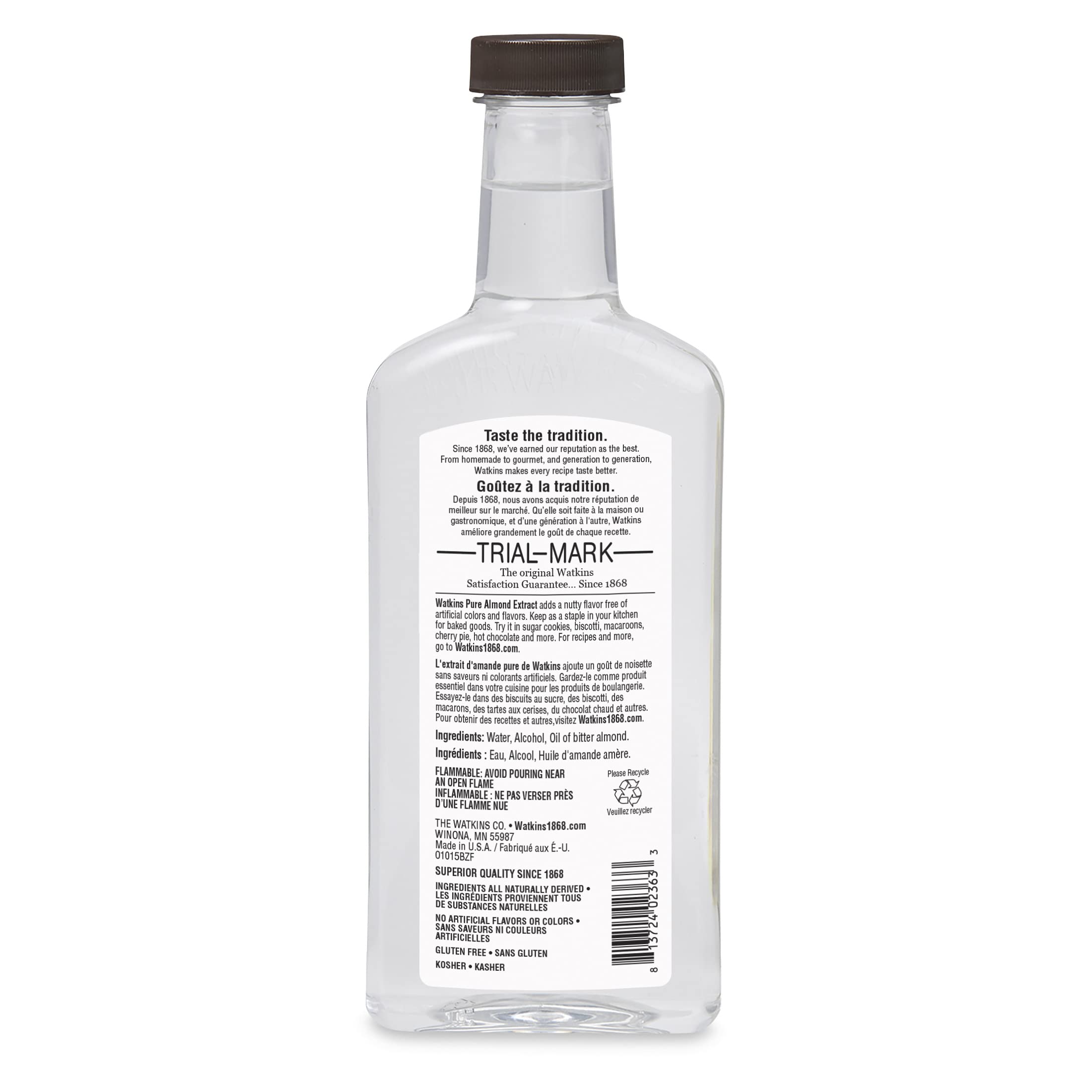 Close-up of Watkins almond extract label highlighting pure ingredients