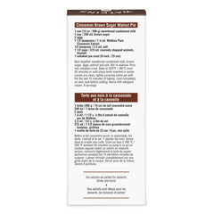 Watkins Pure Cinnamon Extract beside baking ingredients and spices.