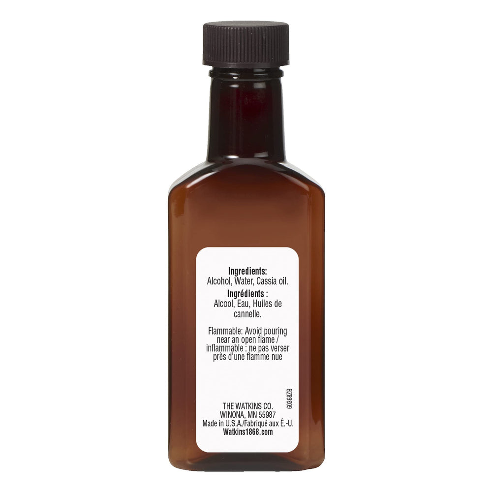Watkins Pure Cinnamon Extract label close-up showing ingredients.