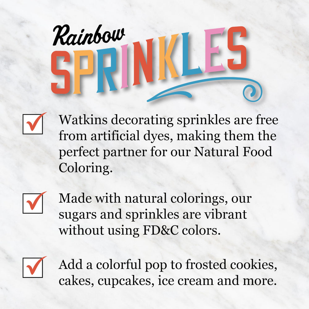 Watkins Rainbow Sprinkles sprinkled on cookies on a tray