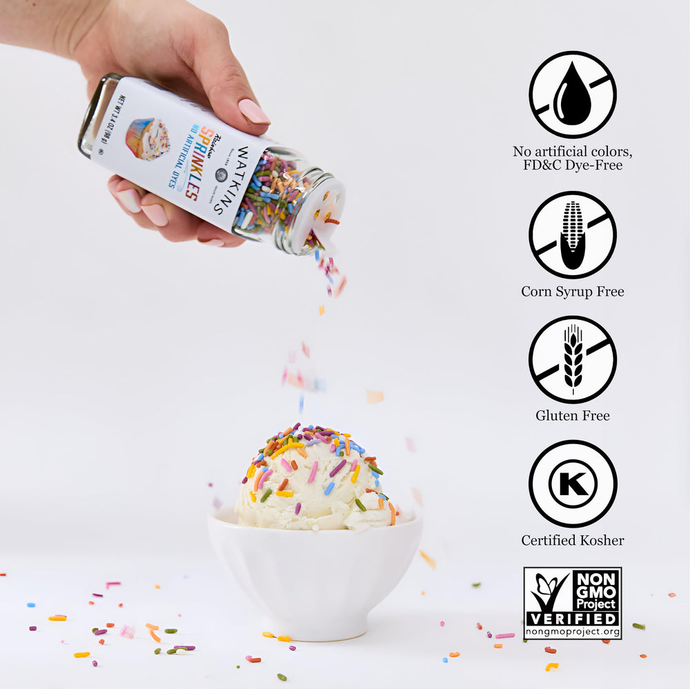 Watkins rainbow sprinkles cupcake decoration with colorful finishing touch.