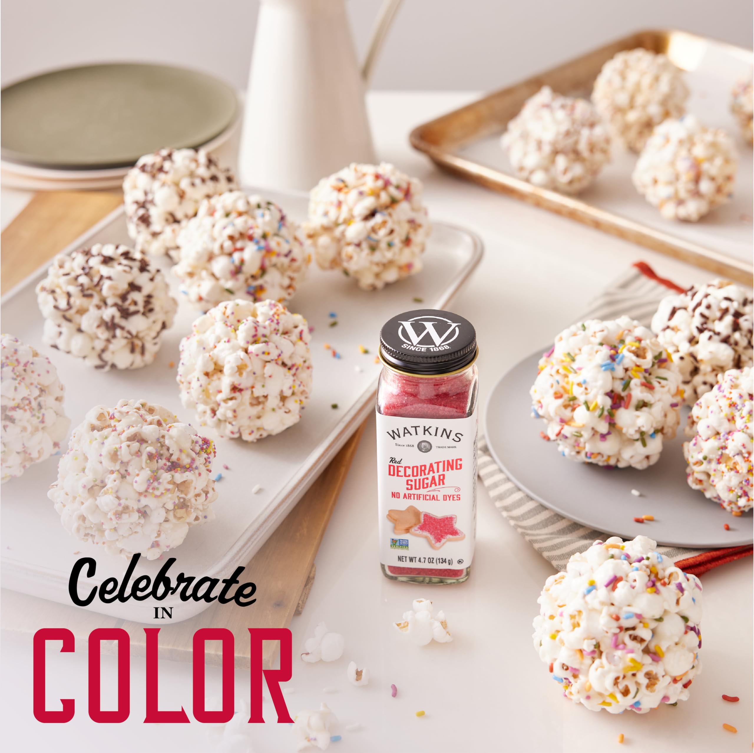 Watkins Red Decorating Sugar on cake borders creates bright accents.