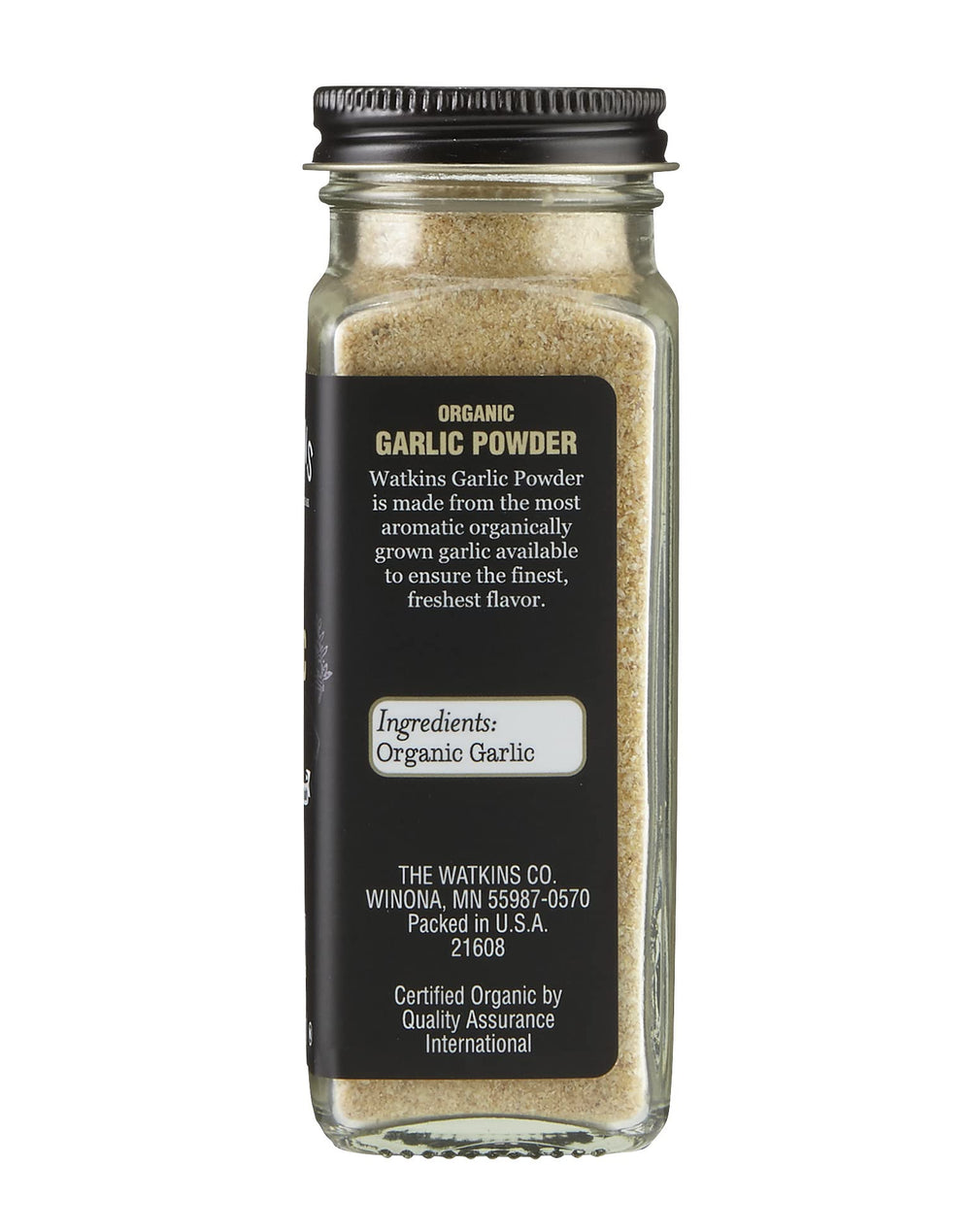 Close-up of Watkins square glass grinder showcasing gourmet storage.