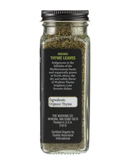 Watkins thyme leaves inside the square glass grinder for precise seasoning