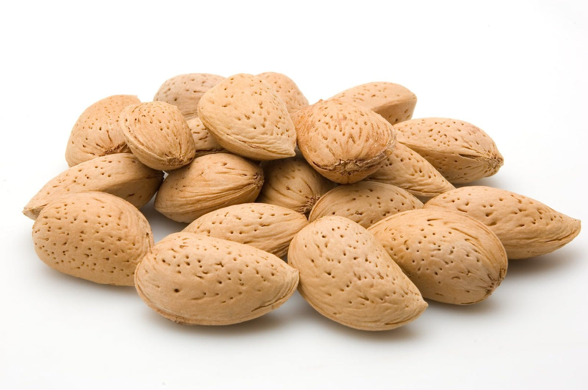 We Got Nuts jumbo California almonds in-shell close-up, fresh and unsalted for on-the-go snacking.