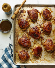 We Rub You Bulgogi sauce glazed meat plated for family-style dining.