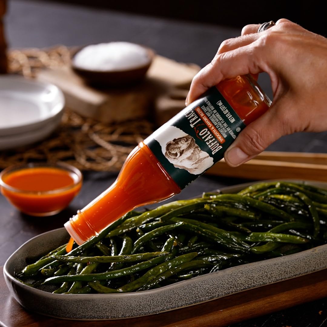 Weber Buffalo Trace hot sauce on plated dish for bold finish.