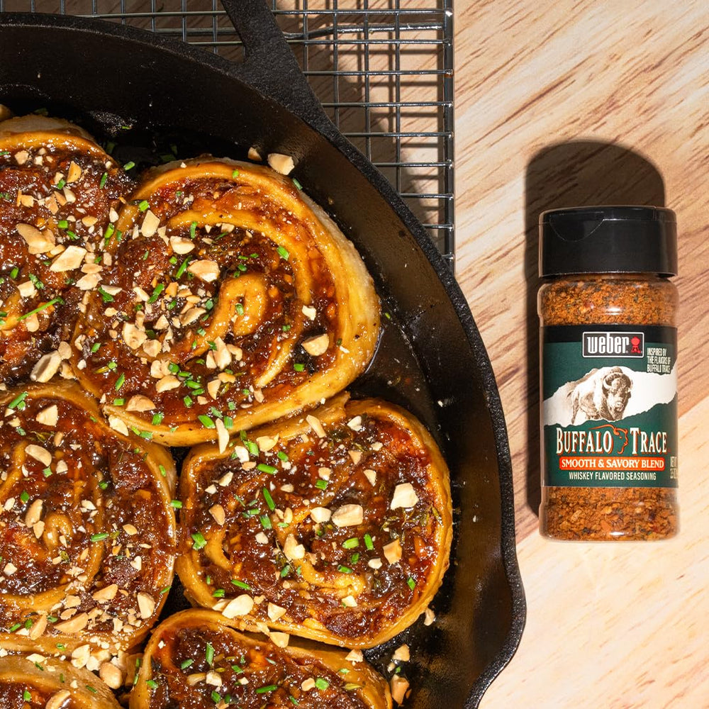 Weber Buffalo Trace seasoning on a burger patty for tasty crust