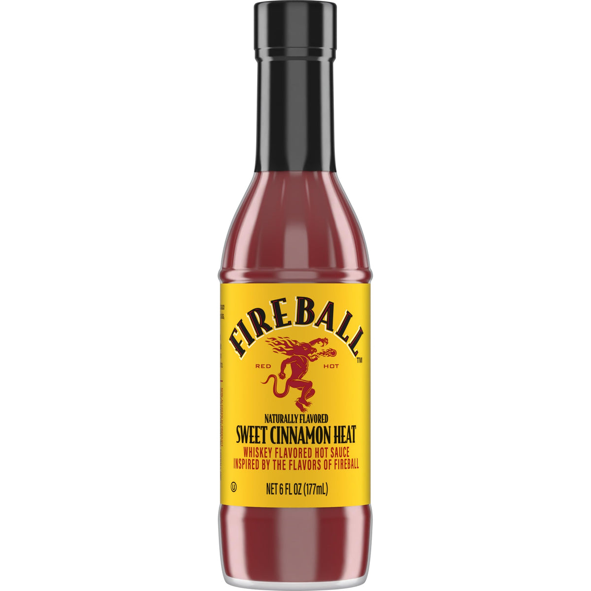 Weber Fireball hot sauce bottle on grill, ideal for bold wings and ribs.