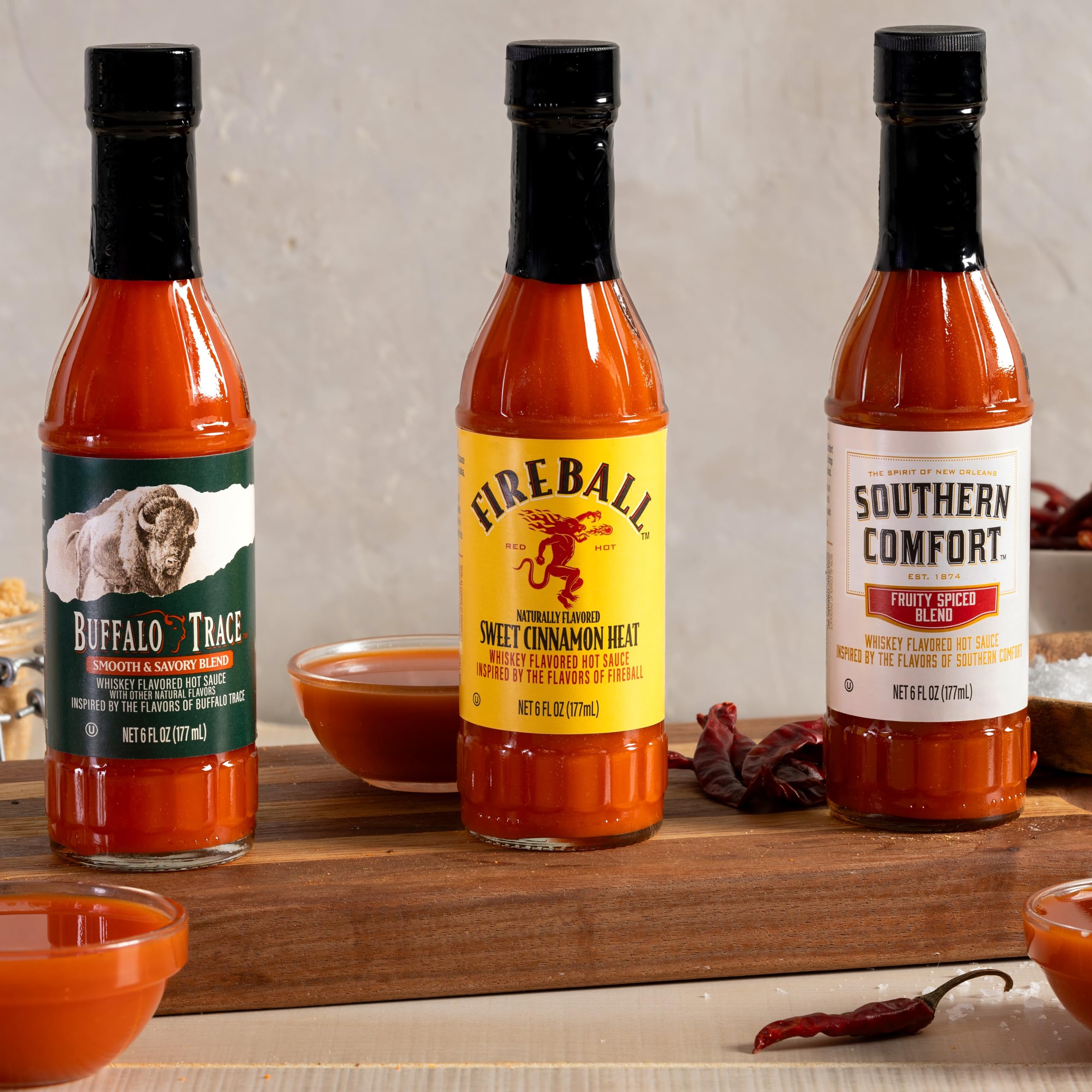 Weber Fireball bottle with cinnamon sticks, great with desserts and snacks.