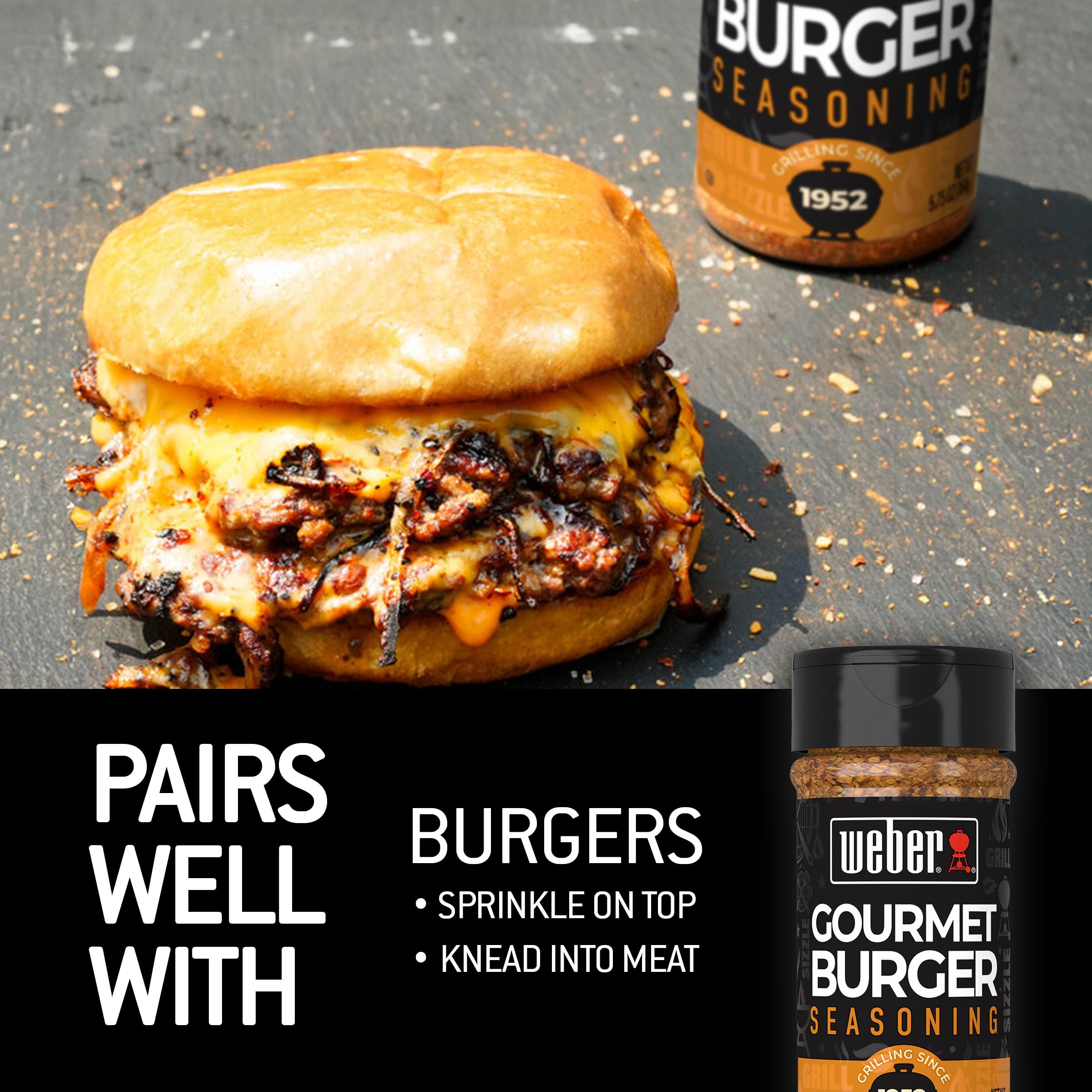 Weber Gourmet Burger Seasoning bottle beside a grill setup.