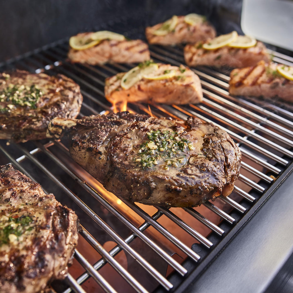 Weber Savory Steakhouse Seasoning on grill setup suggests easy backyard flavor boost
