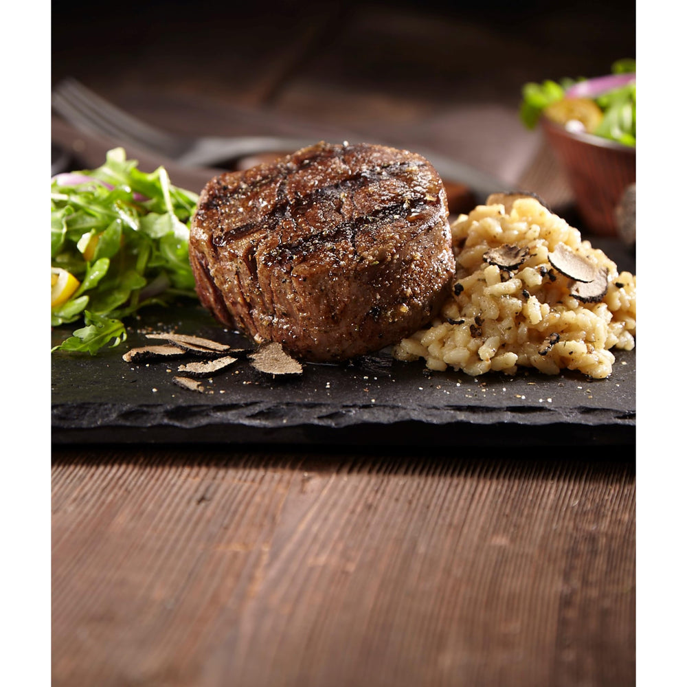 Weber Steak 'n Chop Seasoning finishing dust over plated dish
