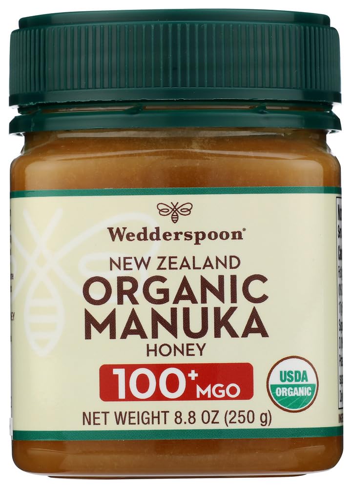 Wedderspoon Manuka Honey 100+ MGO jar with creamy texture, perfect for tea and toast.