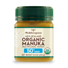 Wedderspoon Manuka honey jar close-up shows organic 50+ MGO richness for daily wellness.