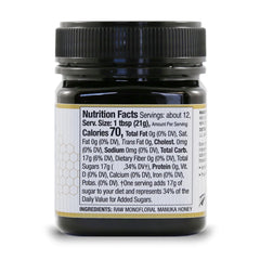 Closeup of Wedderspoon jar showcasing creamy Manuka texture and bold flavor.