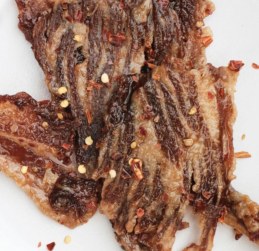 Weekend Jerky thin and crispy texture close-up highlights satisfyingly light chew