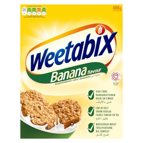 Weetabix Banana Biscuits milk dunk closeup emphasizes texture