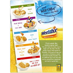 Weetabix on breakfast table with fruit and yogurt