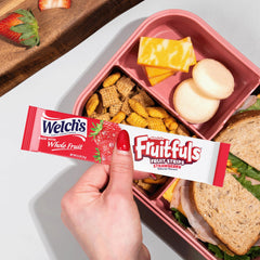 On-the-go Welch's Fruitfuls strawberry strip in a busy family day.