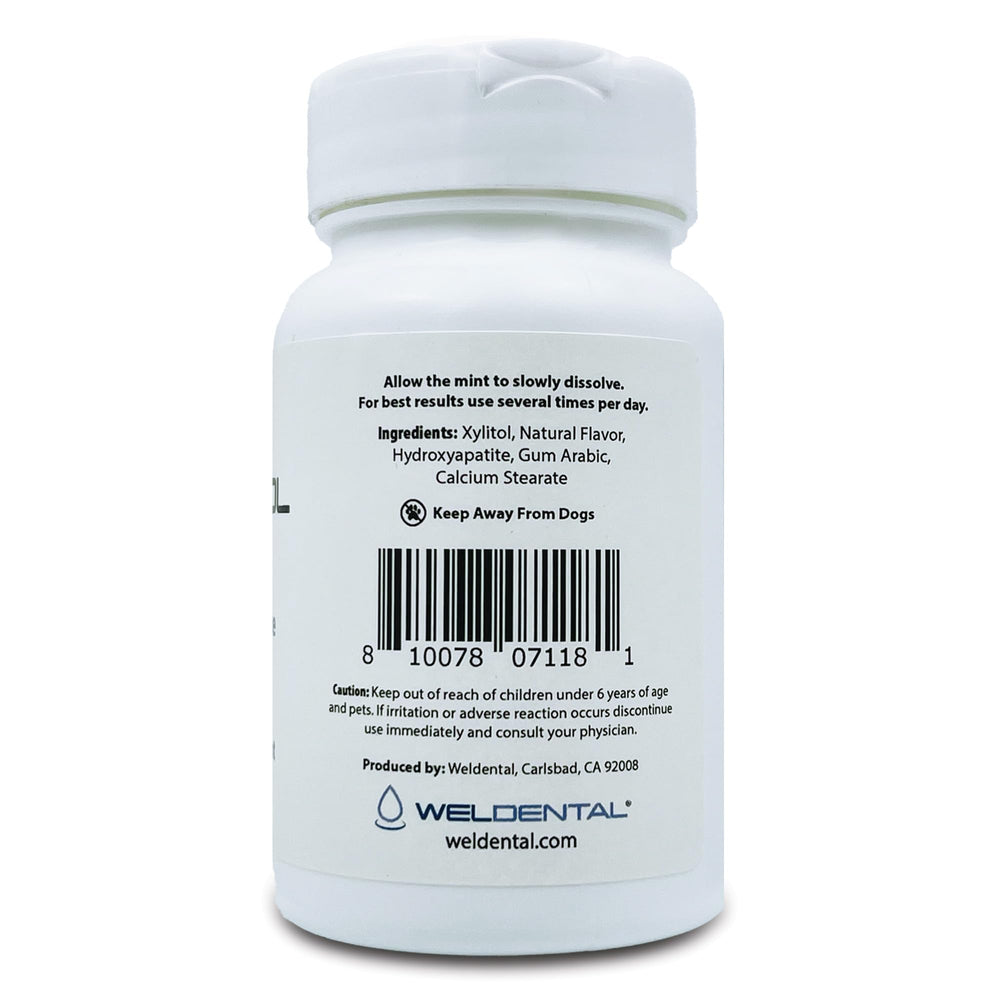 Close-up of Weldental Xylitol Mints highlighting micro hydroxyapatite and minty breath-freshening appeal
