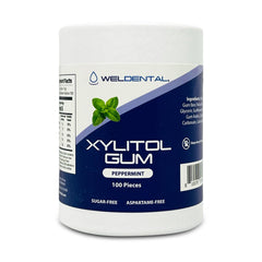 Welldental Xylitol Gum packaging in a cardboard tube with plant-based bag for eco-friendly design.