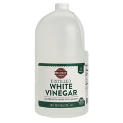 Wellsley Farms Distilled White Vinegar bottle on counter for easy kitchen prep.
