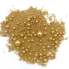 Cookies decorated with Weraru gold pearl sugar sprinkles for celebration treats