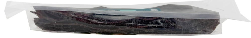 Werner hot and spicy beef jerky slab promoting bold flavor bites.
