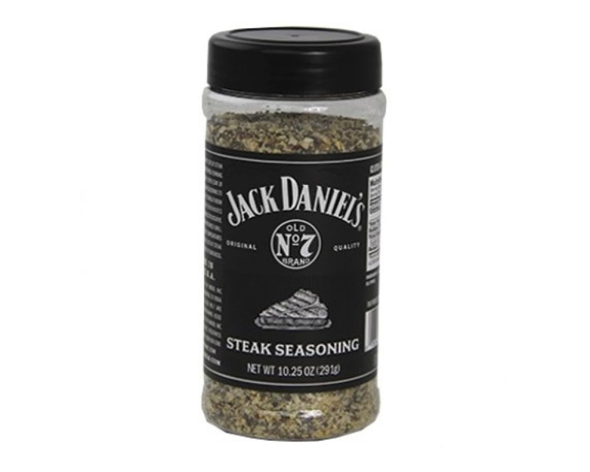 Western Jack Daniels Original Quality Steak Seasoning tub close-up highlights large flavorful granules.