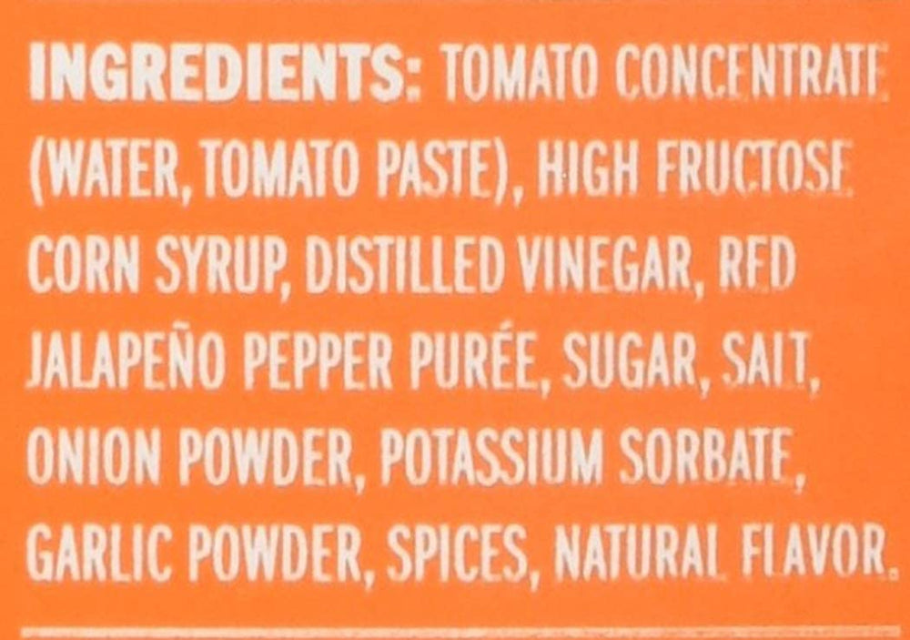 Whataburger spicy ketchup label close-up highlighting flavor profile.
