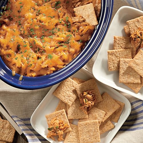 Wheat Thins BIG Snacks cracker tilt to show thin crisp texture