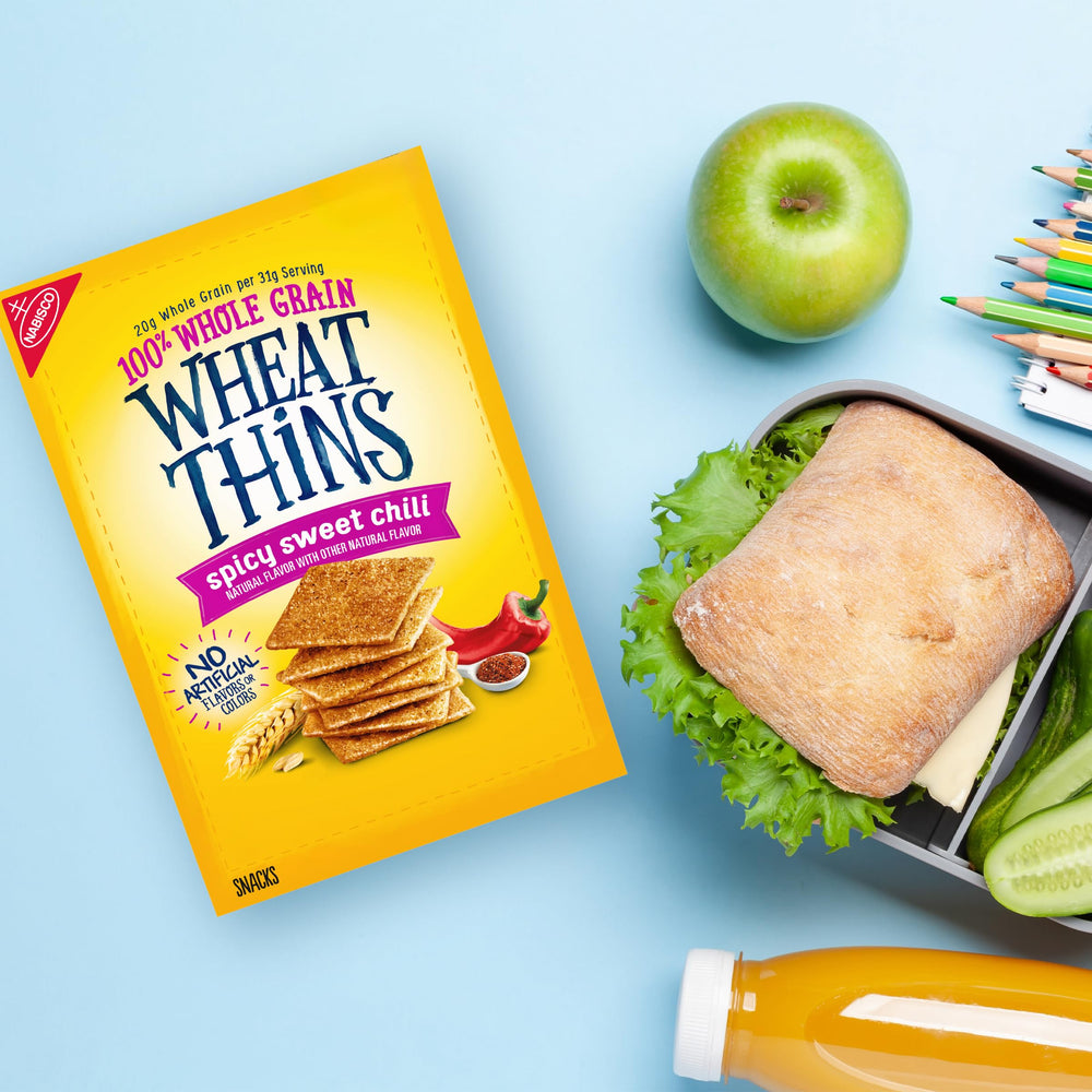 Wheat Thins on cheese board showcases snack-friendly pairings.