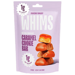 Whims Oat Milk Chocolate Caramel Cookie Bar packaging showcases clean ingredients for on-the-go snacking.
