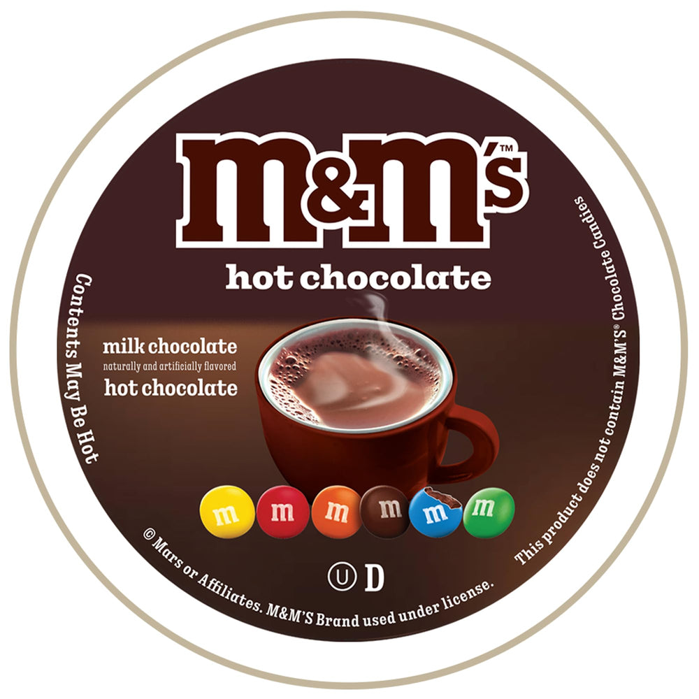 White Coffee M&M Hot Cocoa Pods closeup milk chocolate, creamy texture in every cup.