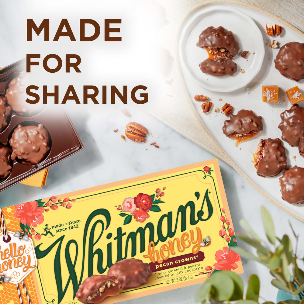 Whitmans smooth milk chocolate with honey caramel and pecans.